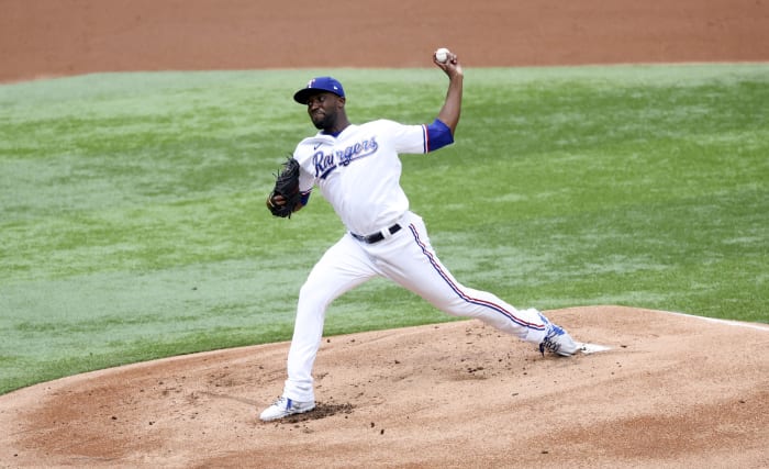 Apr 11, 2022; Arlington, Texas, USA; Texas Rangers starting pitcher Taylor Hearn (52) throws during the first inning against the Colorado Rockies at Globe Life Field. Mandatory Credit: Kevin Jairaj-USA TODAY Sports